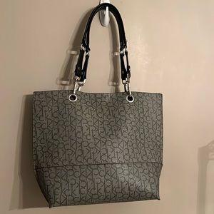Calvin Klein oversize travel tote and matching clutch